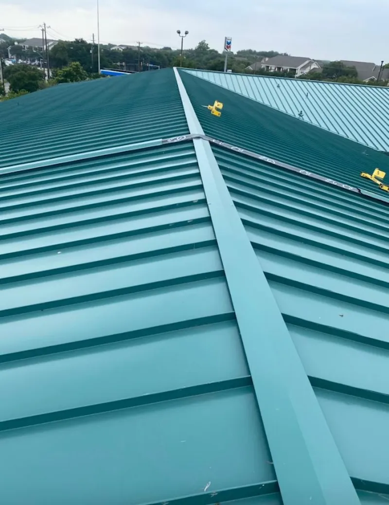 Green commercial metal roof ridge and valley for Metal Roof Repair in Sky Lake